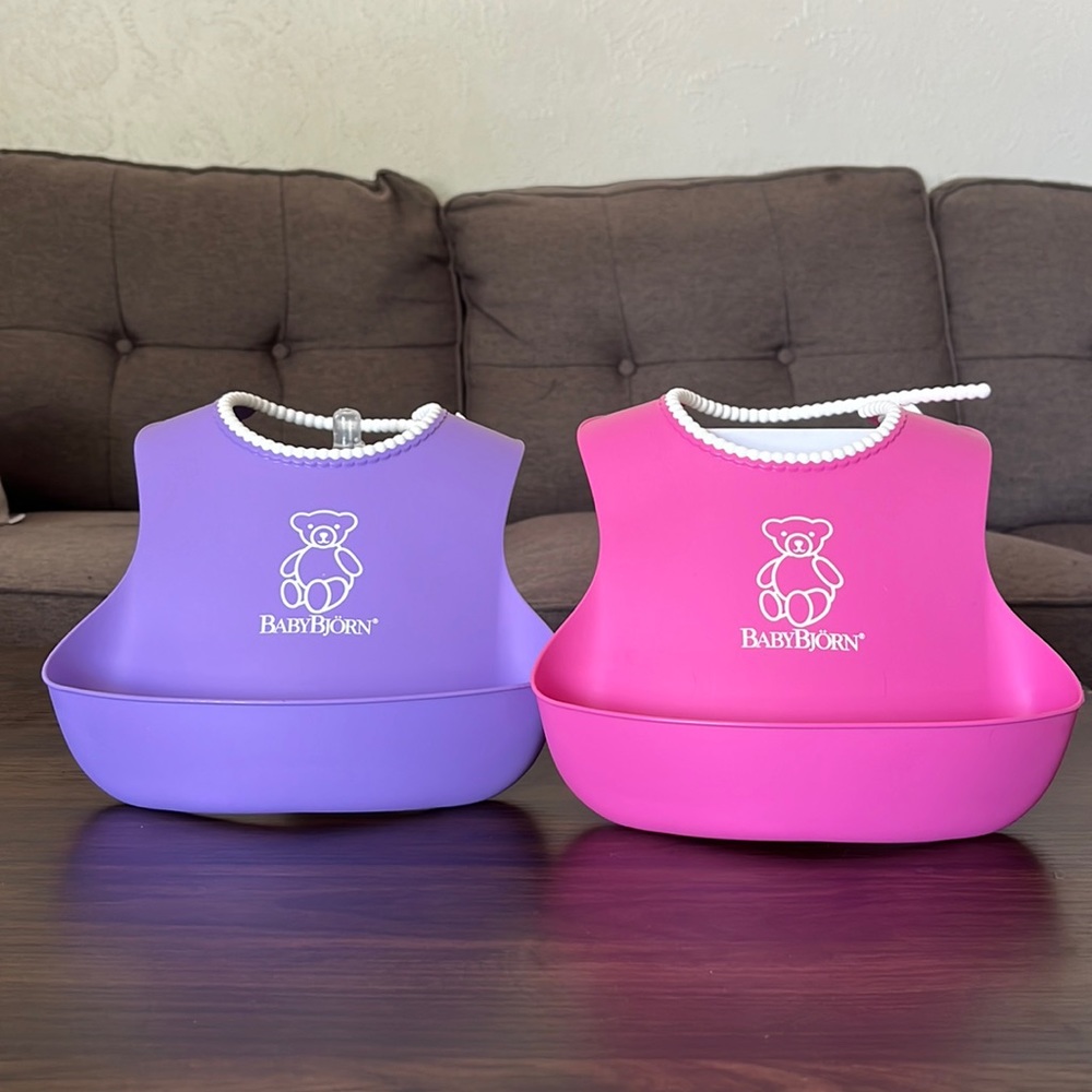 Set of 2 Baby Bjorn bibs - pink & purple